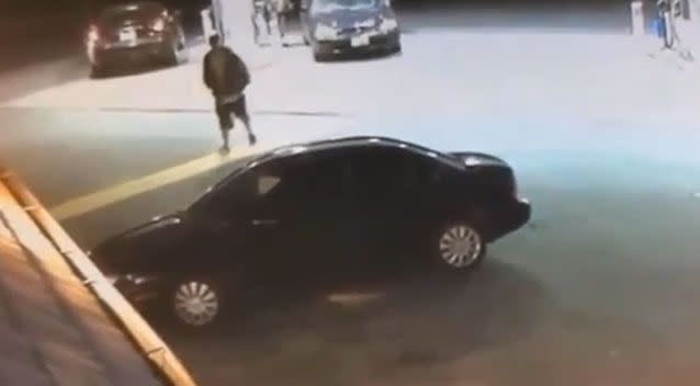 The moment the would-be thief walked up to the car. Photo: YouTube