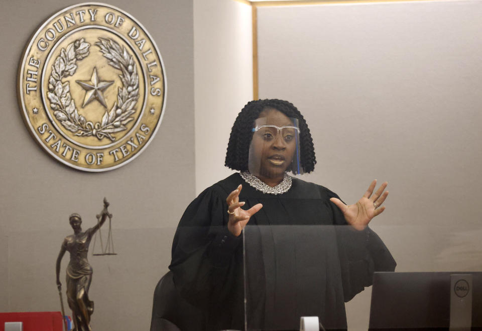 203rd Judicial District Court judge Raquel "Rocky" Jones delivers her opening remarks before the murder trial of Billy Chemirmir at the Frank Crowley Courts Building in Dallas, Monday, Nov. 15, 2021. Chemirmir is charged with killing 18 older women in Dallas and its suburbs over a two-year span. (Tom Fox/The Dallas Morning News via AP, Pool)