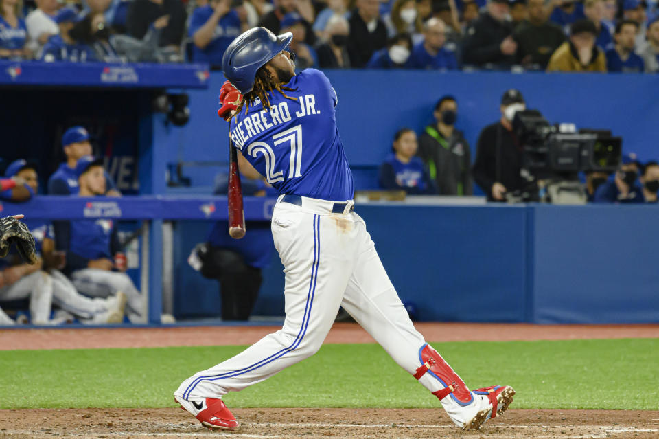 Toronto Blue Jays' Vladimir Guerrero Jr. watches his home run during the third inning against the Houston Astros in a baseball game Friday, April 29, 2022, in Toronto. (Christopher Katsarov/The Canadian Press via AP)