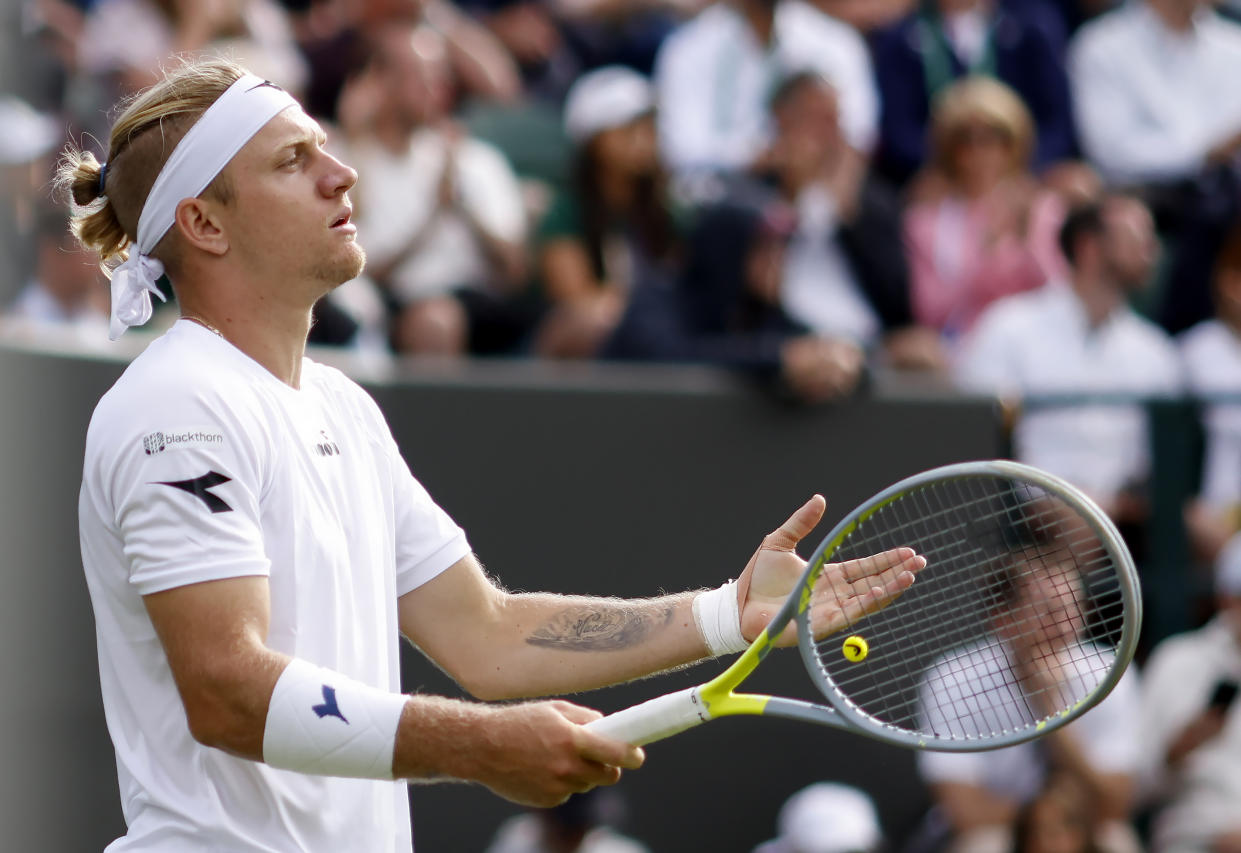 Alejandro Davidovich Fokina reacts during his match against Hubert Hurkacz during day one of the 2022 Wimbledon Championships at the All England Lawn Tennis and Croquet Club, Wimbledon. Picture date: Monday June 27, 2022. (Photo by Steven Paston/PA Images via Getty Images)