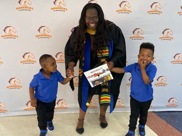 Ke'Yonna Hall with her two kids on graduation day