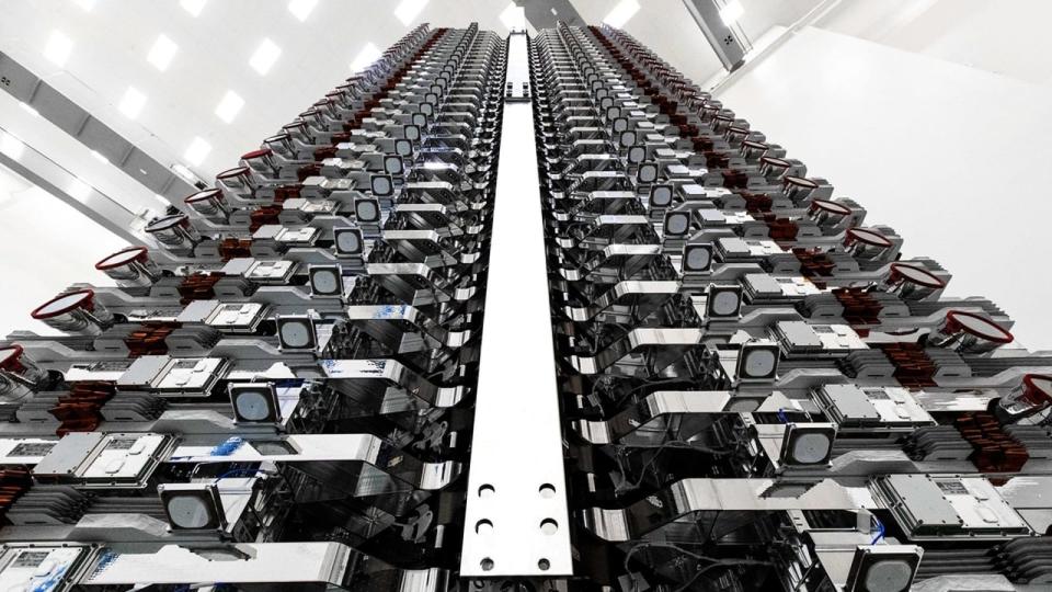 SpaceX Starlink satellites, shown flat-packed in preparation for launch.