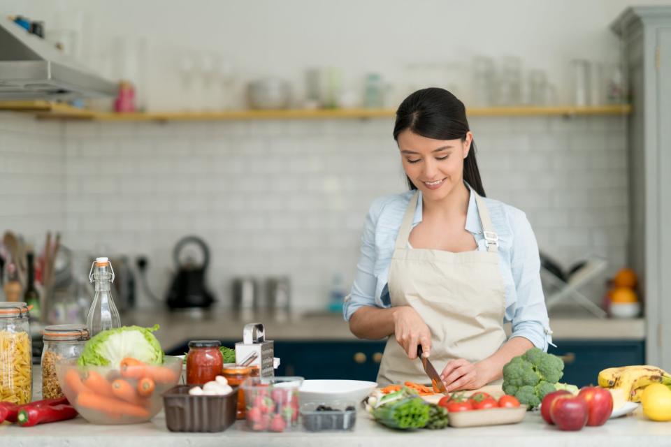 Woman cooking in kitchen