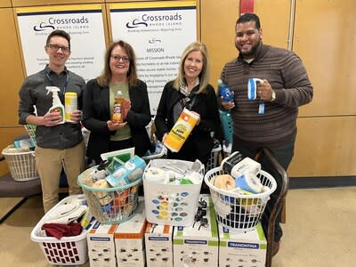 Washington Trust employees donated 25 ‘Welcome Home Kits’ to benefit Crossroads Rhode Island. From L to R: Ric Wild, Crossroads RI Community Outreach & Volunteer Manager; Mary Noons, Washington Trust President & Chief Operating Officer; Laura Calenda; Crossroads RI Chief Marketing and Philanthropy Officer; and Louis Arias, Washington Trust Flex Banker at the future Olneyville Branch in Providence.