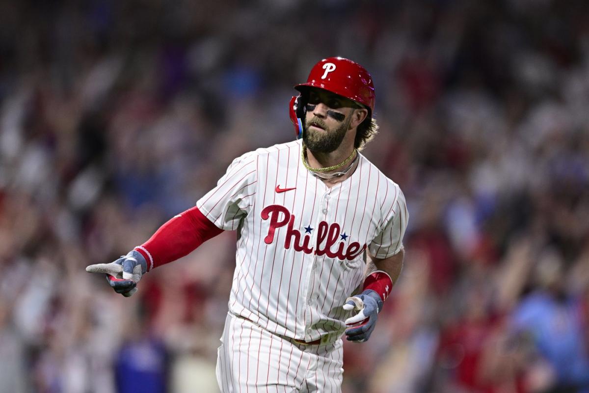 Phillies top Cardinals 6-1 for their 8th straight home win after Suárez leaves early with an injury