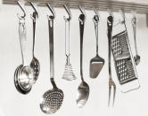 Keep utensils close to the cooking action by hanging a rail above the stovetop.<br><br><a rel="nofollow" href="https://au.lifestyle.yahoo.com/better-homes-gardens/g/26218651/fridge-vs-pantry-the-great-food-storage-debate/14977928/" data-ylk="slk:READ MORE: Fridge vs pantry: the great food storage debate;elm:context_link;itc:0;sec:content-canvas" class="link ">READ MORE: Fridge vs pantry: the great food storage debate </a>