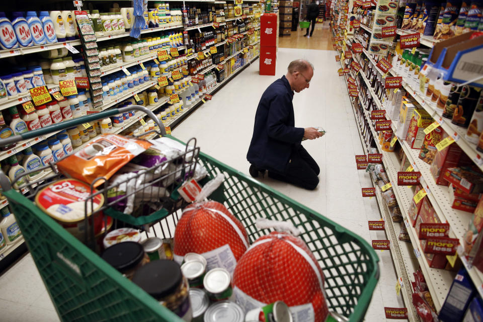 Scott Macaulay shops and cooks for strangers every Thanksgiving for his annual dinner. (Photo: Jessica Rinaldi for the Boston Globe via Getty Images)