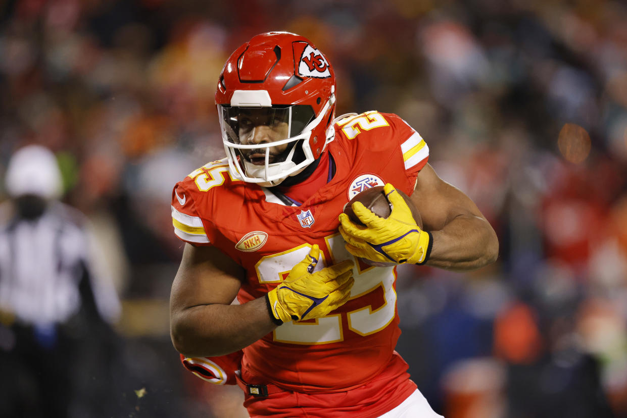 KANSAS CITY, MISSOURI - JANUARY 13: Clyde Edwards-Helaire #25 of the Kansas City Chiefs runs with the ball during the second half against the Miami Dolphins in the AFC Wild Card Playoffs at GEHA Field at Arrowhead Stadium on January 13, 2024 in Kansas City, Missouri. (Photo by David Eulitt/Getty Images)