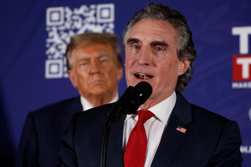 North Dakota Governor Doug Burgum encourages voters to support Republican presidential candidate and former President Donald Trump during a campaign rally in the basement ballroom of The Margate Resort on January 22, 2024 in Laconia, New Hampshire. (Getty Images)