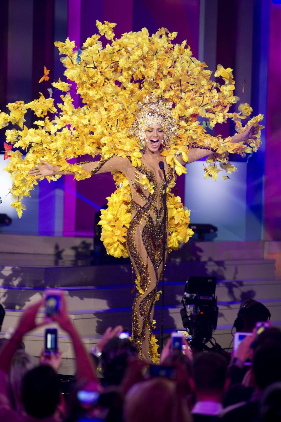 Migbelis Castellanos, Miss Venezuela 2014, debuts her national costume during the Miss Universe Preliminary Show in Miami