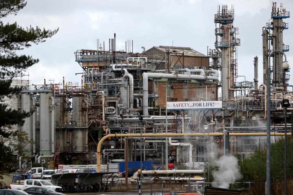 The ExxonMobil Esso Oil refinery is pictured in Fawley, near Southampton, southern England on October 4, 2021. - The British military started delivering fuel to petrol stations on Monday, after a tanker driver shortage sparked two weeks of panic-buying by motorists and emptied pumps. (Photo by Adrian DENNIS / AFP) (Photo by ADRIAN DENNIS/AFP via Getty Images)