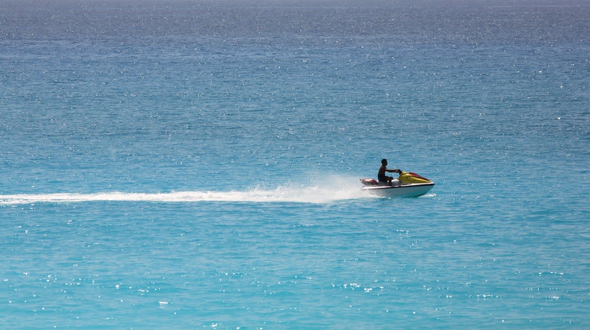 Stock image of jet skier in Caribbean (Getty Images/iStockphoto)