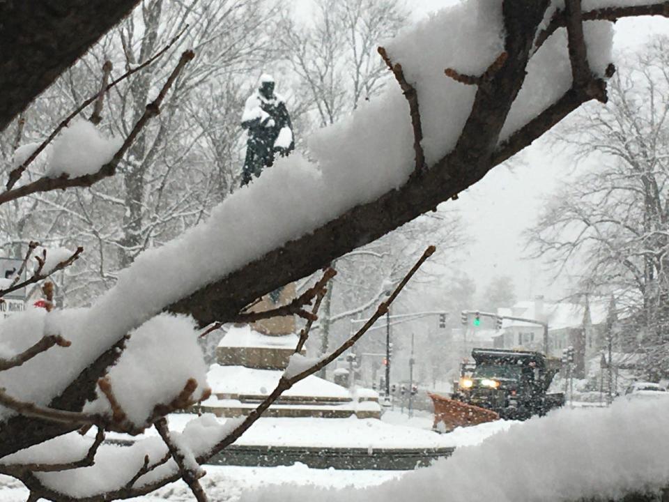 The Robert Treat Paine statue is seen during the first   plowable snow of the season on Friday, Jan. 7, 2022.