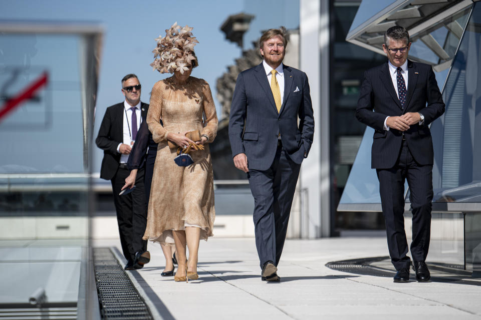 King Willem-Alexander of the Netherlands and Queen Maxima visit the roof terrace of the Reichstag building of the German Bundestag in Berlin, Germany, Tuesday, July 6, 2021. The Dutch royal couple is in Berlin for a three-day state visit. (Fabian Sommer/dpa via AP)