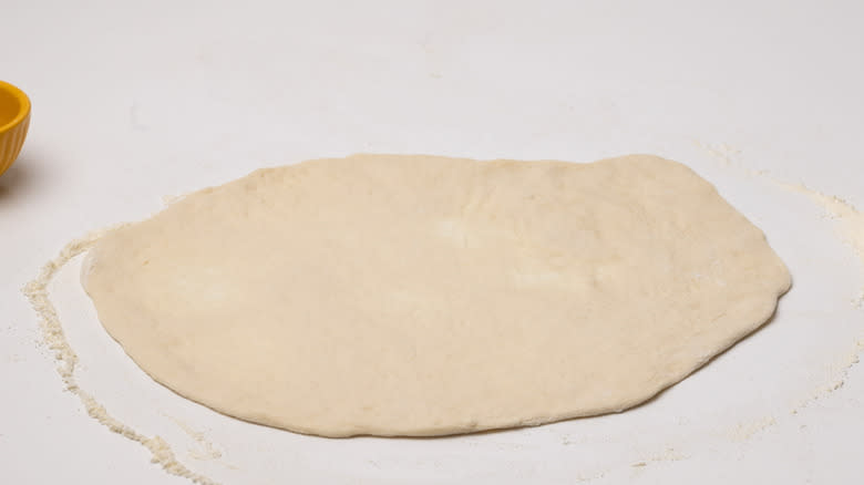 pizza dough stretched out