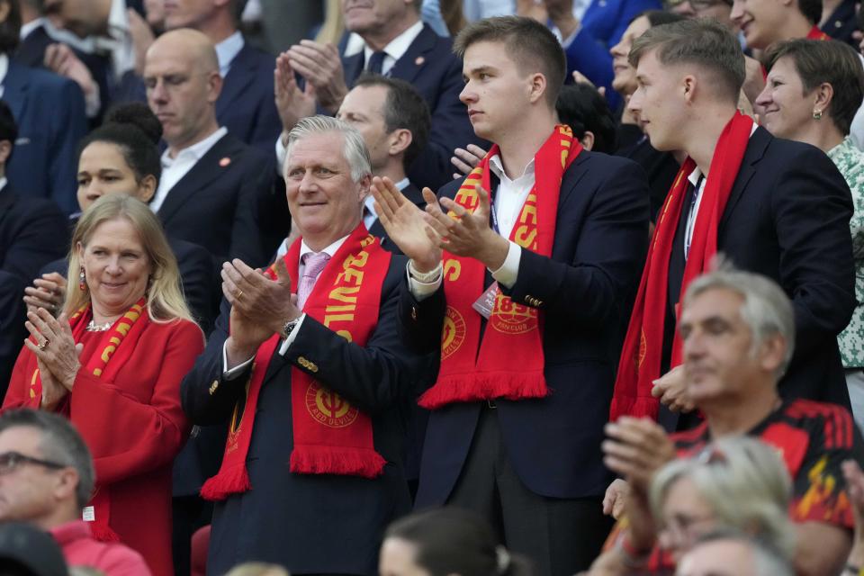 Belgium's King Philippe, Queen Mathilde, Prince Emmanuel and Prince Gabriel arrive for a Group E match between Belgium and Romania at the Euro 2024 soccer tournament in Cologne, Germany, Saturday, June 22, 2024. (AP Photo/Martin Meissner)