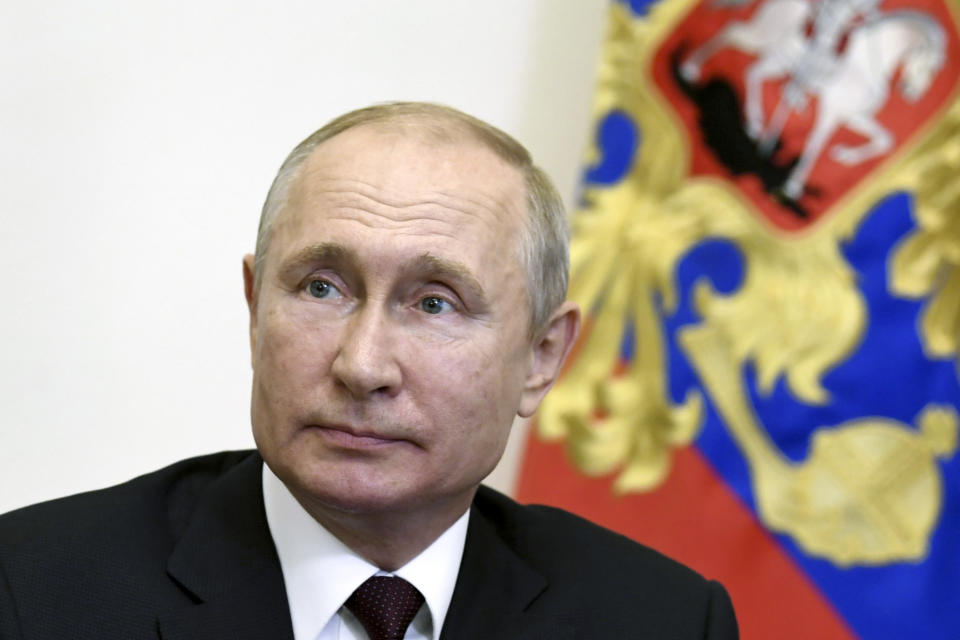 Russian President Vladimir Putin chairs a Security Council meeting via teleconference at the Novo-Ogaryovo residence outside Moscow, Russia, Thursday, June 4, 2020. (Alexei Nikolsky, Sputnik, Kremlin Pool Photo via AP)