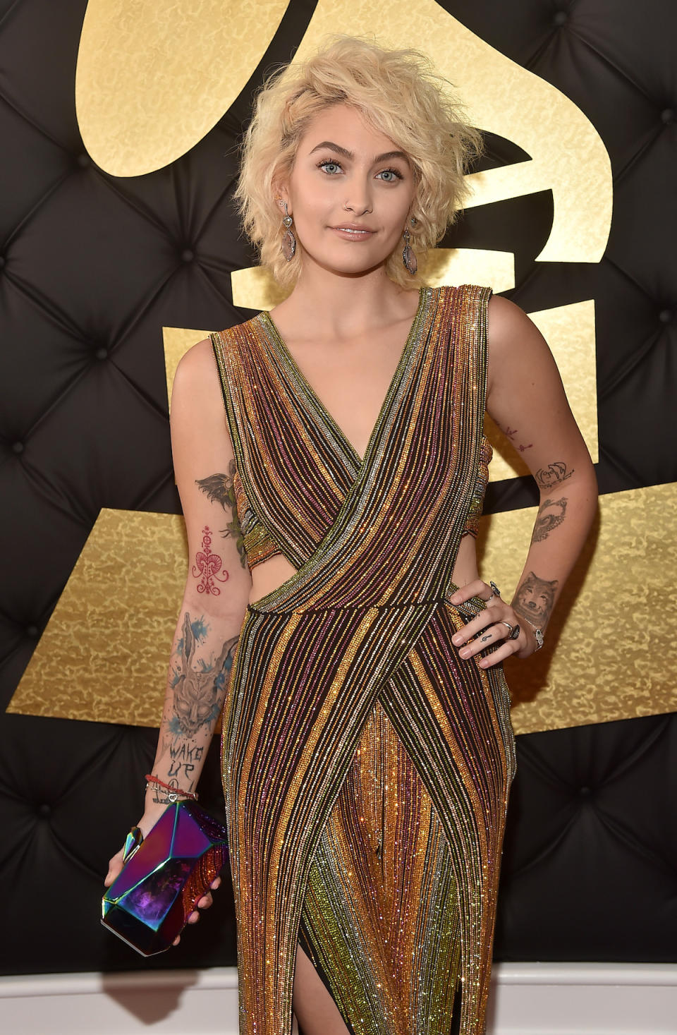 <p>The 18-year-old has 50 tattoos, and she put them on display in her cutout Balmain jumpsuit. (Photo: Getty Images) </p>