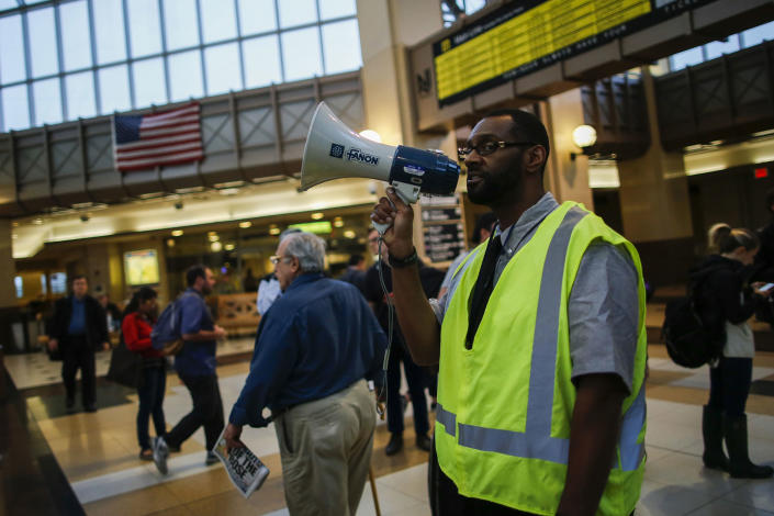<p>A NJ transit worker gives instruction to people as they make their commute from New York to Hoboken throw the Secaucus Junction Station after a NJ Transit train crashed in to the platform at Hoboken Terminal September 29, 2016 in Secaucus, New Jersey. (Eduardo Munoz Alvarez/Getty Images) </p>