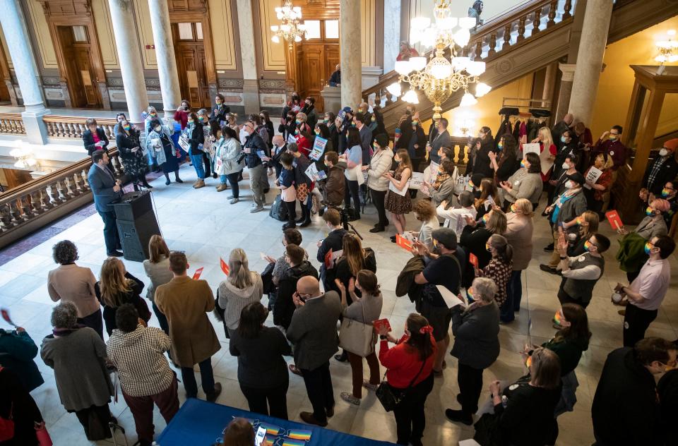 Demonstrators gather for a "Let Kids Play" rally coordinated by ACLU Indiana on Wednesday, Feb. 9, 2022, at the Statehouse in Indianapolis. The group rallied ahead of the afternoon Senate education committee hearing for House Bill 1041, which would prohibit transgender girls from playing on girls sports teams at the K-12 level.