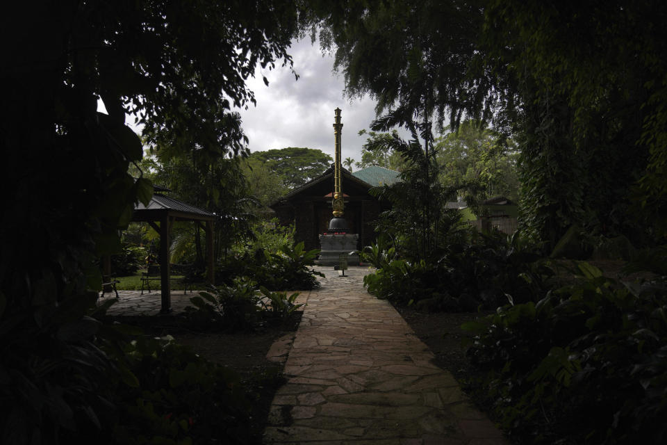 The Kadavul Temple, where the monks worship and meditate together every morning, sits at the front end of Kauai's Hindu Monastery on July 13, 2023, in Kapaa, Hawaii. The temple was constructed by the monks with lava rocks and consecrated in 1973. (AP Photo/Jessie Wardarski)