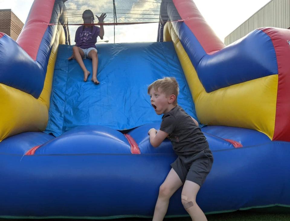 There was something for everyone at Thursday night's downtown concert with John Scalia & The Dirty Word. For kids, the bouncy house proved to be a popular spot.