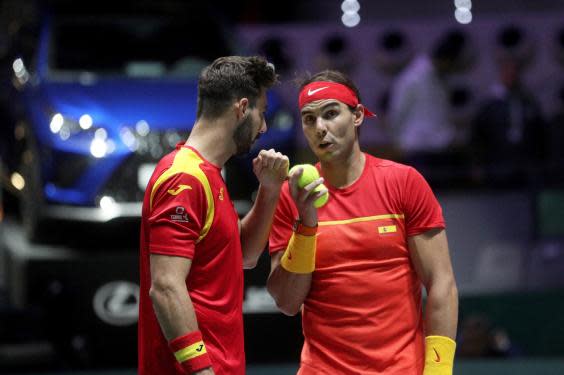 Nadal chats between pointsin Madrid (EPA)