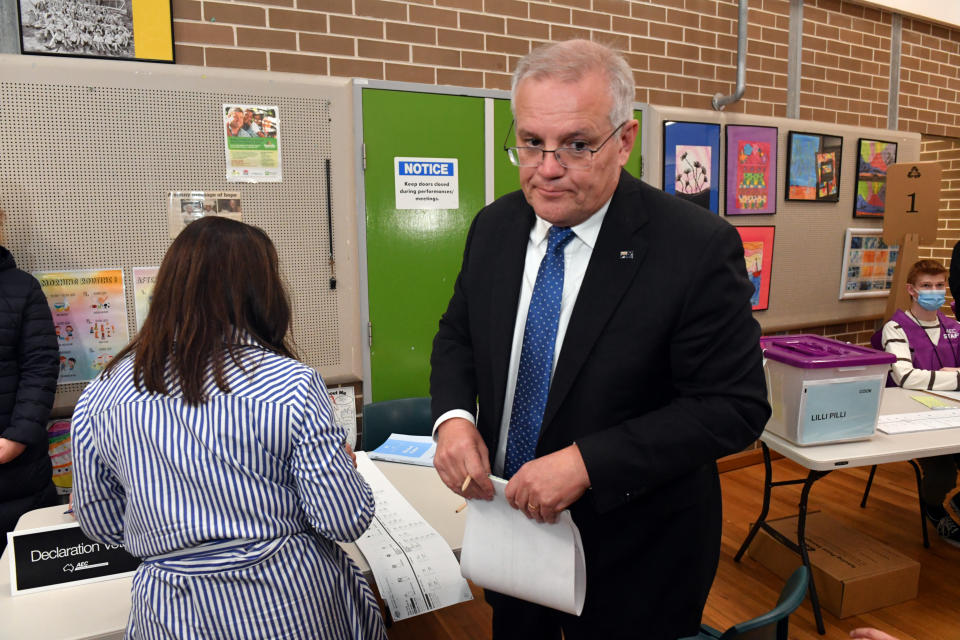 Prime Minister Scott Morrison and wife Jenny arrive to vote at the Lilli Pilli Public School on Saturday. Source: AAP