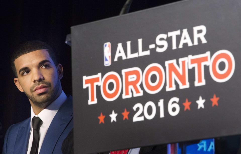 Rapper Drake looks on during an announcement that the Toronto Raptors will host the NBA All-Star game in Toronto, September 30, 2013. Toronto was selected as the host of the National Basketball Association's (NBA) 2016 All-Star Game, marking the first time the showcase event will be held outside of the United States, the league said on Monday. REUTERS/Mark Blinch (CANADA - Tags: SPORT BASKETBALL ENTERTAINMENT)