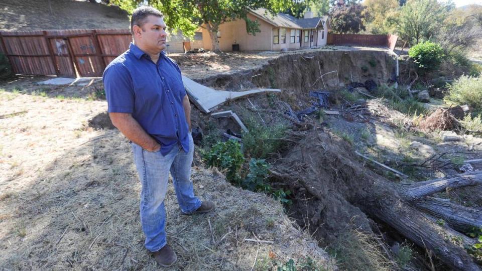 Aaron Spiller lost most of his Atascadero backyard and his house was red-tagged as uninhabitable by the City of Atascadero after storm debris rerouted the flow of Graves Creek into his yard during the March 2023 storms. Pictured here on Oct. 18, 2023.