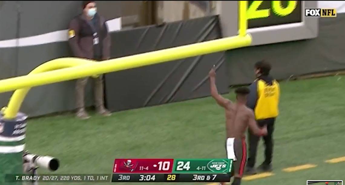 Antonio Brown of the Tampa bay Buccaneers stripped off his pads and uniform, throwing some gear to fans in the stands, before walking off the field mid-game.