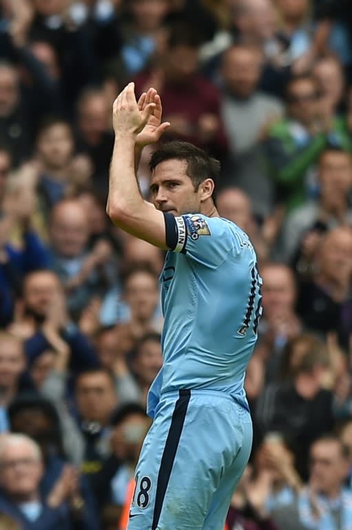 Manchester City midfielder Frank Lampard applauds as he leaves the pitch after being substituted during the Premier League match against Southampton at Etihad Stadium on May 24, 2015