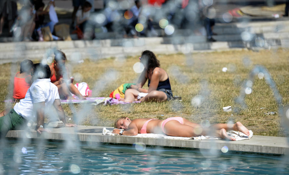Londoners relaxed by the Marble Arch fountains as temperatures soared to 36 degrees in the capital