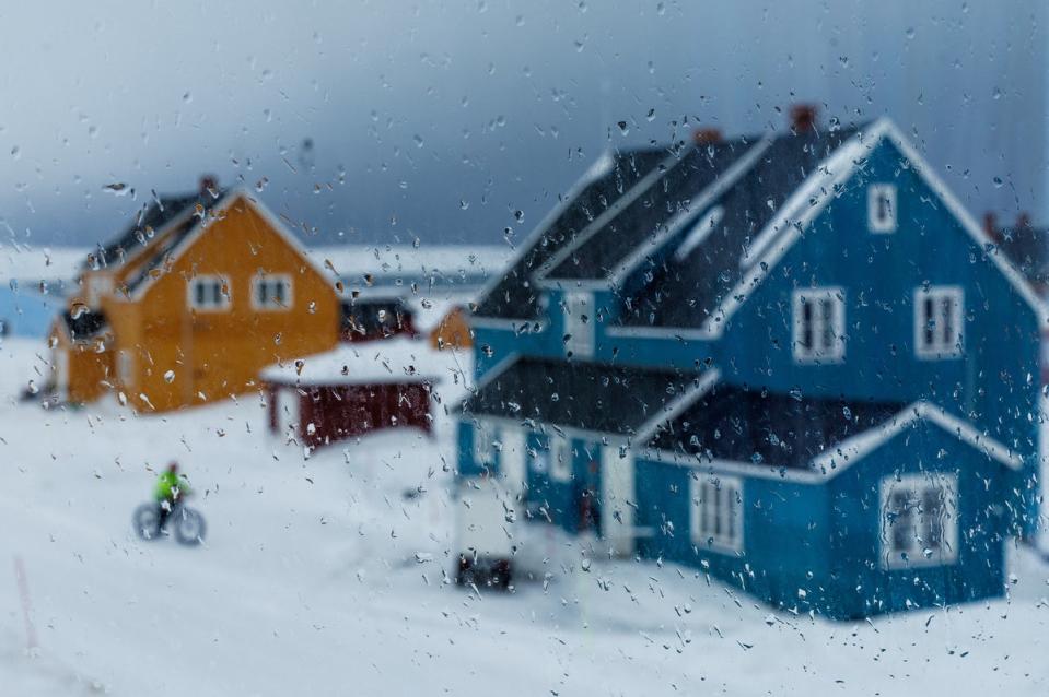 Raindrops are seen on a window as rain approaches Ny-Alesund (Reuters)