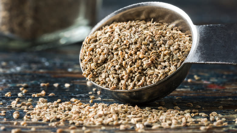 Celery seeds spilling onto table