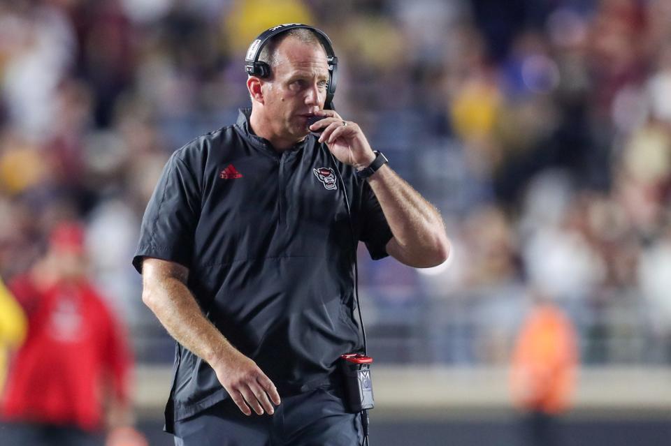 Oct 16, 2021; Chestnut Hill, Massachusetts, USA; North Carolina State Wolfpack head coach Dave Doeren reacts during the first half against the Boston College Eagles at Alumni Stadium. Mandatory Credit: Paul Rutherford-USA TODAY Sports