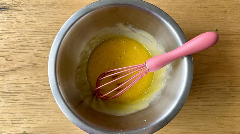 egg yolks whisked in bowl