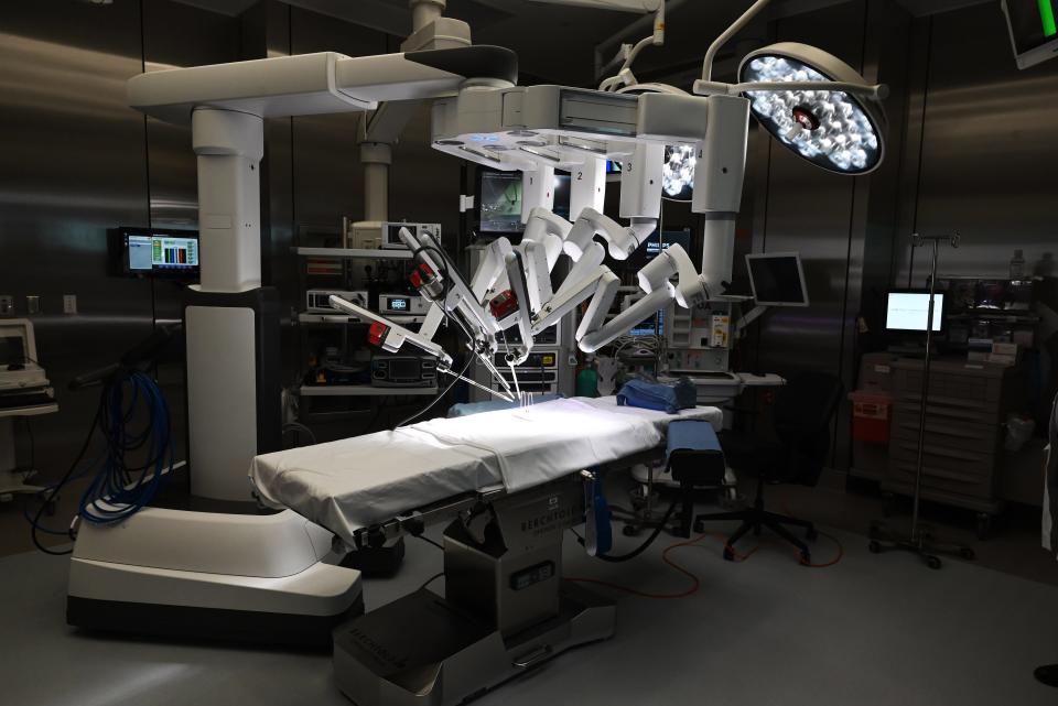 The new Brian D. Jellison Cancer Institute has nine stainless steel operating rooms and three da Vinci Surgical System robots, as pictured here, during a Nov.11 media tour of the new $193 million facility.