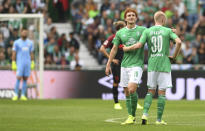 Bremen's Josh Sargent, left, celebrates his side second goal with Davy Klaasen, right, during the Bundesliga soccer match between Werder Bremen and FC Augsburg in Bremen, Germany, Sunday, Sept. 1, 2019. (Carmen Jaspersen/dpa via AP)