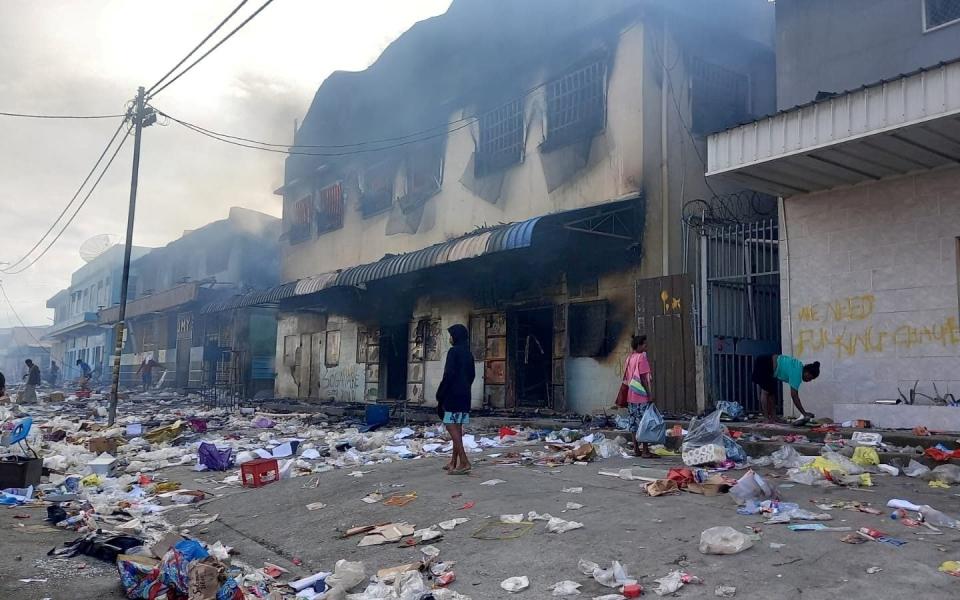 Dozens of properties were torched by an angry mob - Reuters