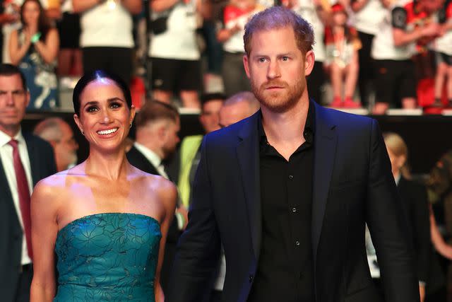 <p>Chris Jackson/Getty</p> Meghan Markle and Prince Harry attend the 2023 Invictus Games closing ceremony.