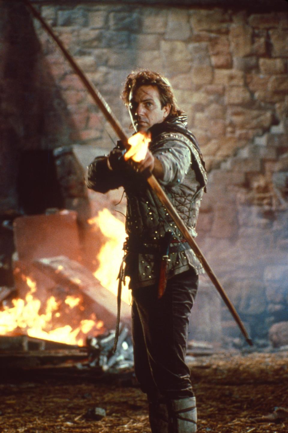 Kevin as Robin Hood with a bow