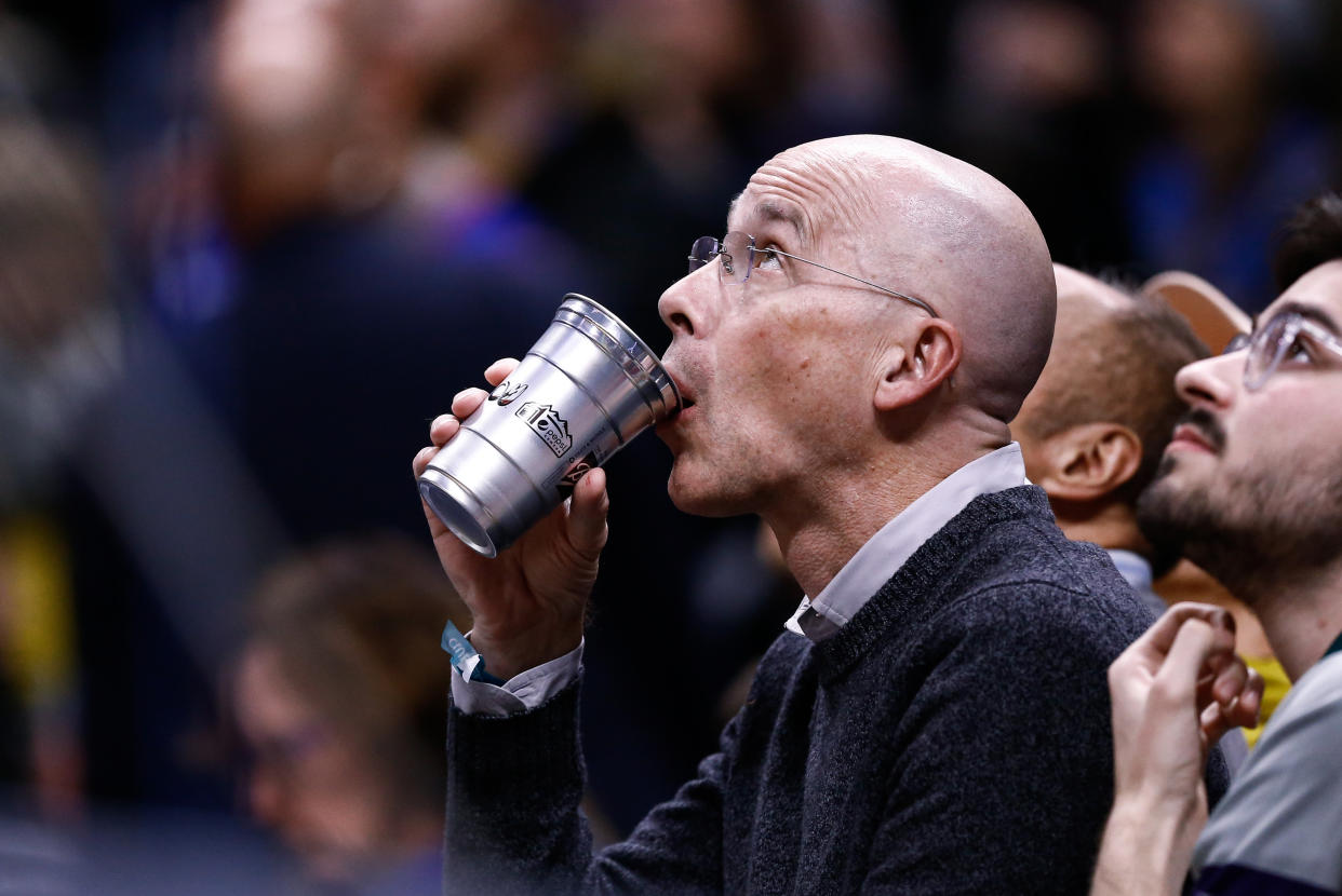 Oct 29, 2019; Denver, CO, USA; A fan drinks from a recyclable aluminum cup in the fourth quarter of a game between the Denver Nuggets and the Dallas Mavericks as the Pepsi Center moves to eliminate plastic. Mandatory Credit: Isaiah J. Downing-USA TODAY Sports