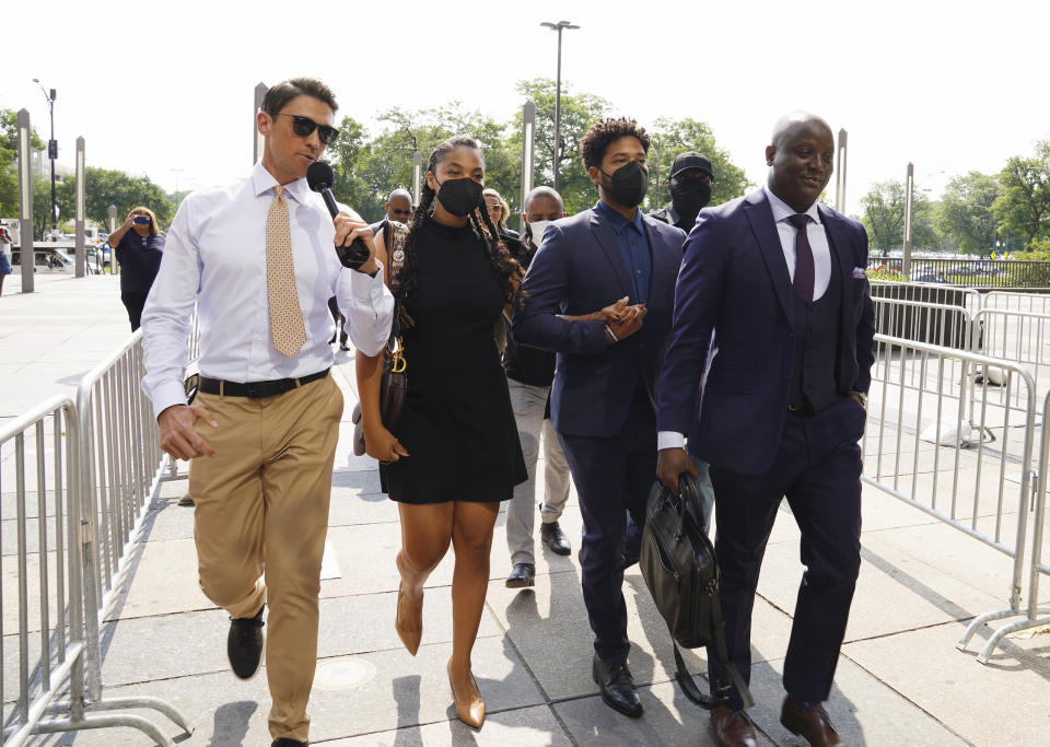 Former “Empire” actor Jussie Smollett, second from right, arrives the George N. Leighton Criminal Court Building for a hearing on, Wednesday, July 14, 2021 in Chicago (Stacey Wescott/Chicago Tribune via AP)