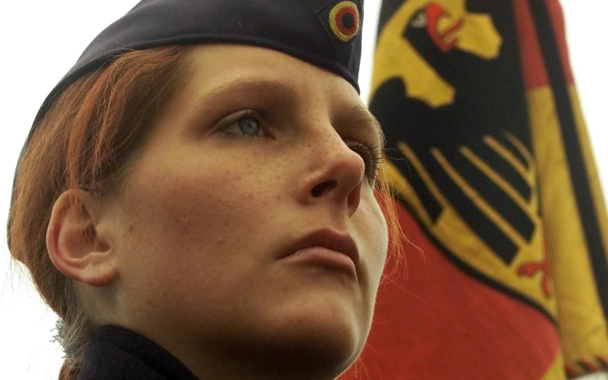 German female recruit Desiree Berghoff attends the first swearing in ceremony with female soldiers of the German air force together with comrades at the 2nd air force battalion barracks in Goslar, about 300 kilometres west of the German capital Berlin -  FABRIZIO BENSCH/Reuters