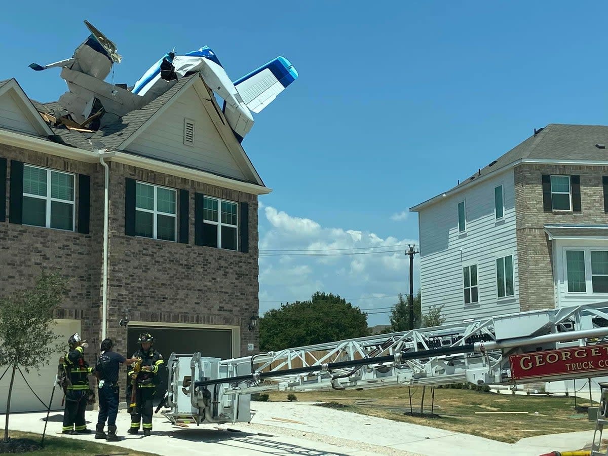 A small plane crashed into a two-story home in Georgetown, Texas, injuring three (Georgetown Texas Fire Department)