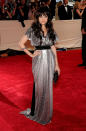 <p>A brunette Nicole Richie shone on the red carpet at the 2010 Costume Institute Gala in a silver Marc Jacobs gown with black waist tie.</p>