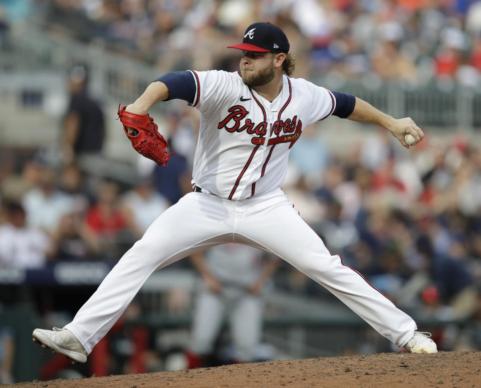 Atlanta Braves pitcher A.J. Minter works against the Washington Nationals in the ninth inning of a baseball game Saturday, July 9, 2022, in Atlanta. (AP Photo/Ben Margot)