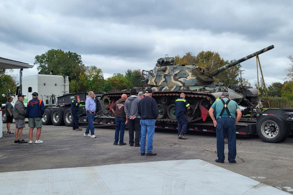 A Vietnam-era tank is pulled into the lot at the American Legion Post 449 in Marysville on Wednesday, Sept. 27, 2023, as crew from Steve's Towing prepare to help position it in place on a nearby concrete pad.