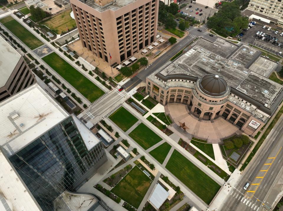 The Capitol Mall in Austin balances giant new buildings with giant old buildings.